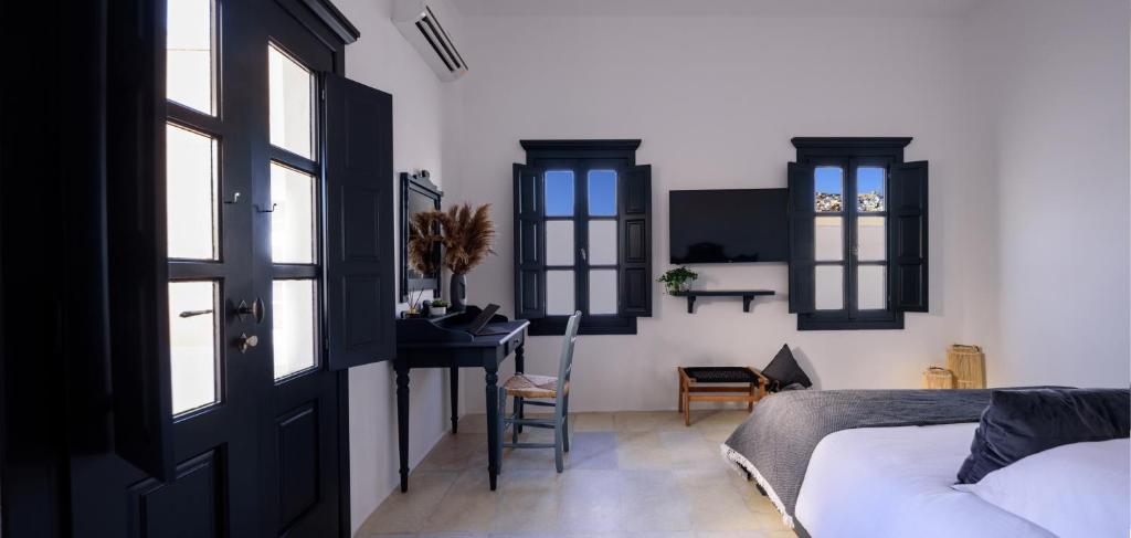 Postel nebo postele na pokoji v ubytování Firalia, Casa in Rock Suites