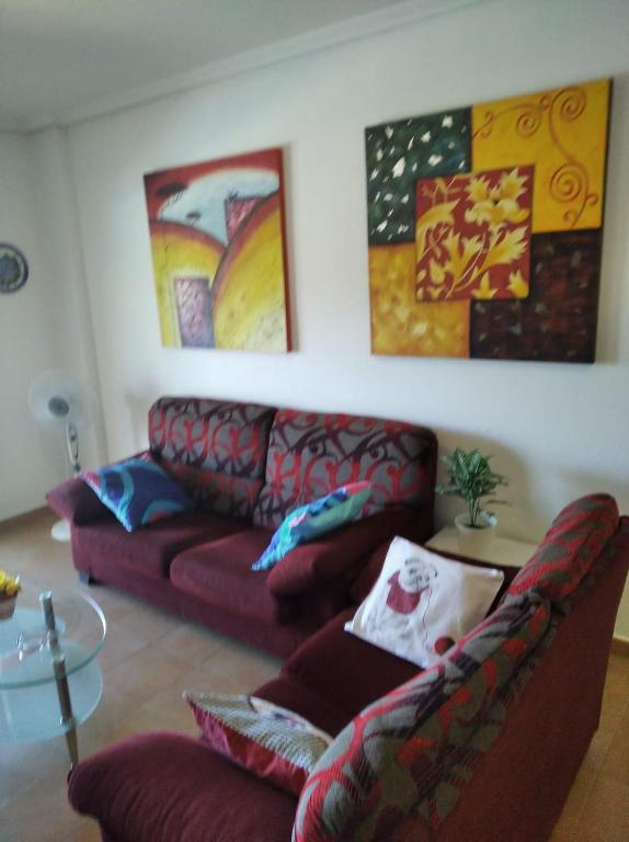 A seating area at Precioso Apartamento Vistar mar/montaña