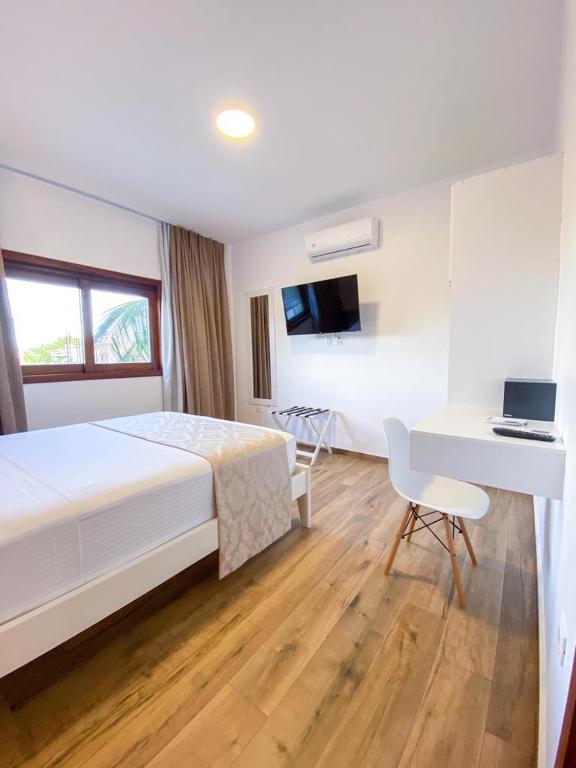 TV a/nebo společenská místnost v ubytování Aiolos Hotel & Discoveries