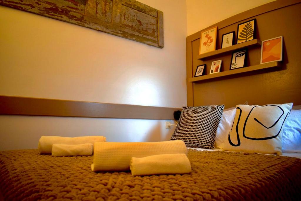 Postel nebo postele na pokoji v ubytování Carmen Art Hotel