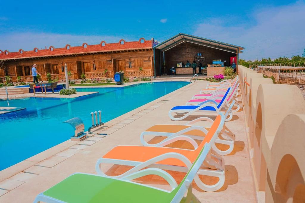 Bazén v ubytování Tunis Pyramids Hotel - فندق اهرامات تونس nebo v jeho okolí