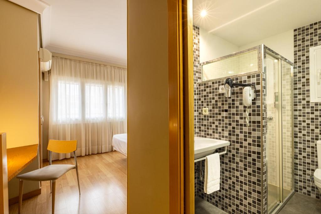 Koupelna v ubytování Hotel Santamaria