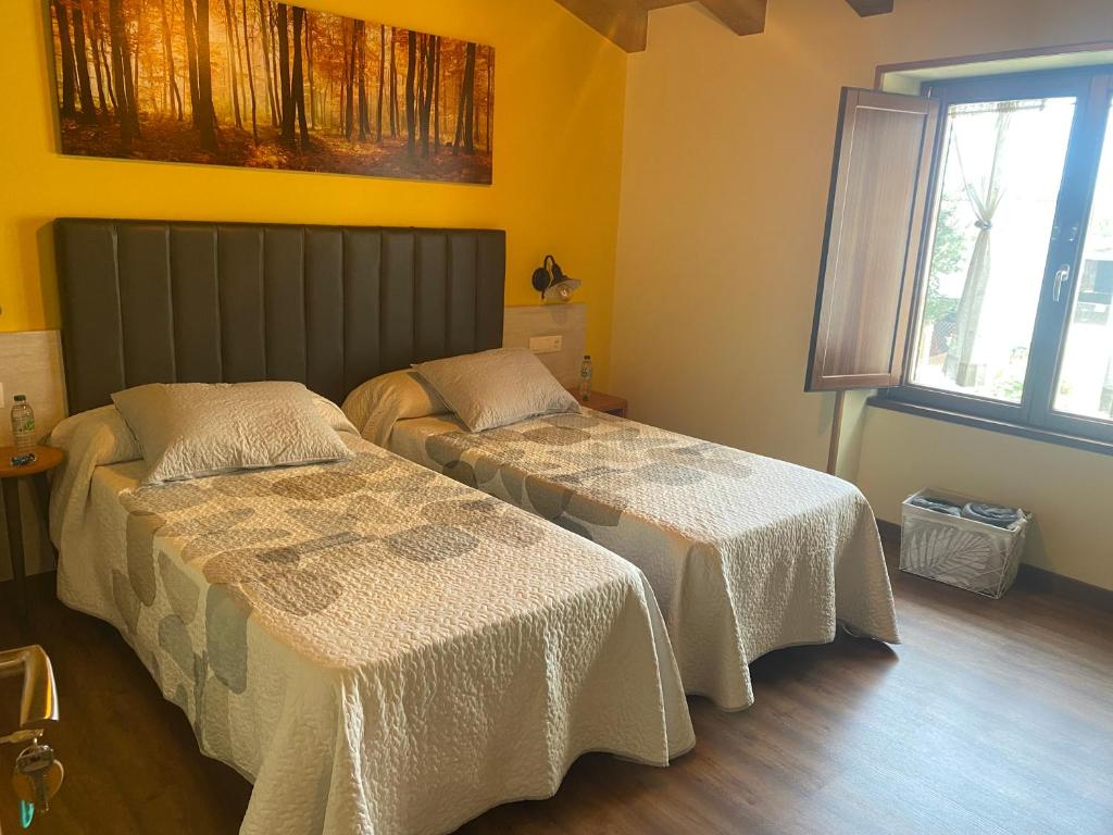 Postel nebo postele na pokoji v ubytování Casa da Cota