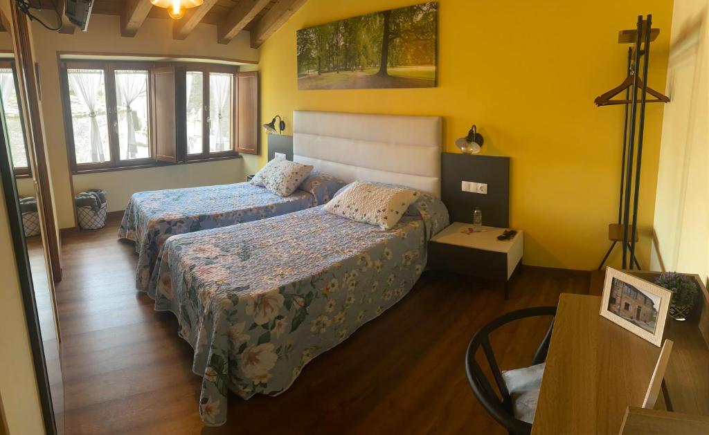 Postel nebo postele na pokoji v ubytování Casa da Cota