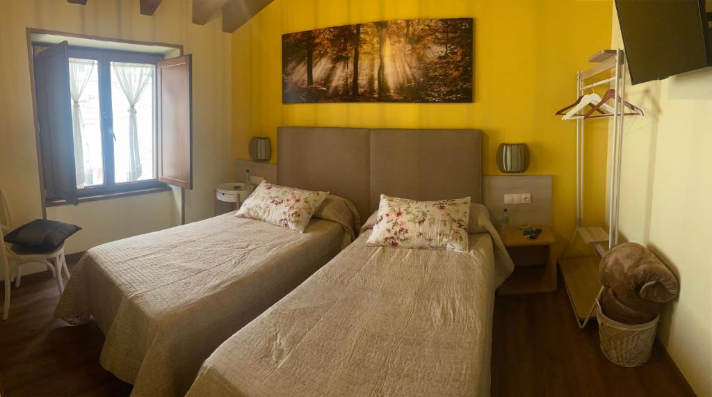 Postel nebo postele na pokoji v ubytování Casa da Cota