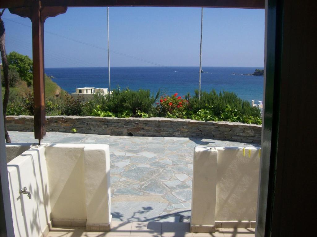 a view of the ocean from a house window at Vassiliki Studios in Andros