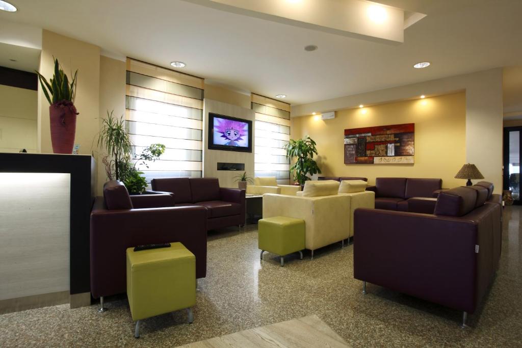 TV a/nebo společenská místnost v ubytování Hotel Gardenia