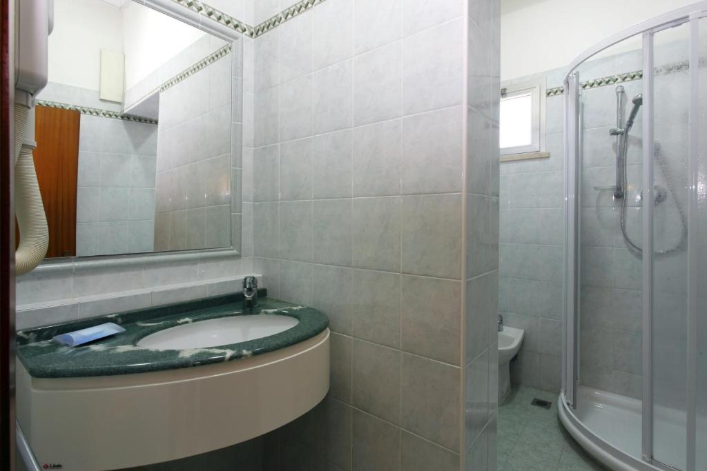 Koupelna v ubytování Hotel Gardenia