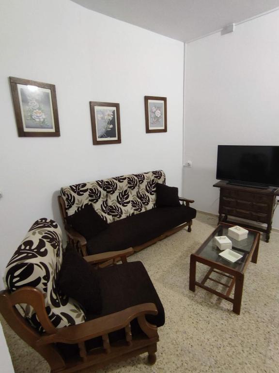 TV a/nebo společenská místnost v ubytování San Gregorio House