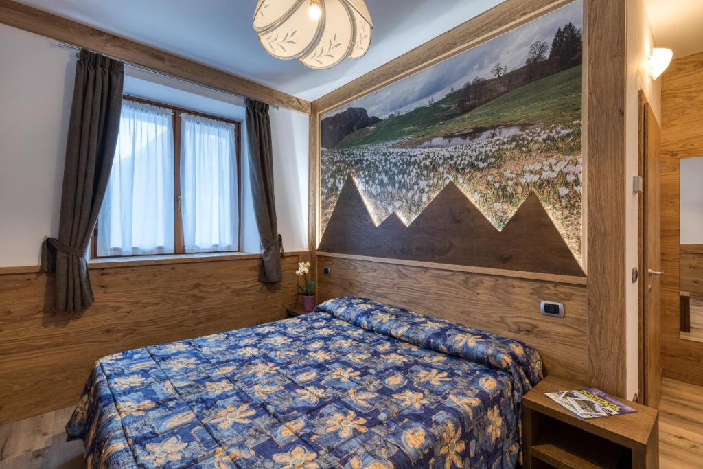Postel nebo postele na pokoji v ubytování Hotel Al Sole