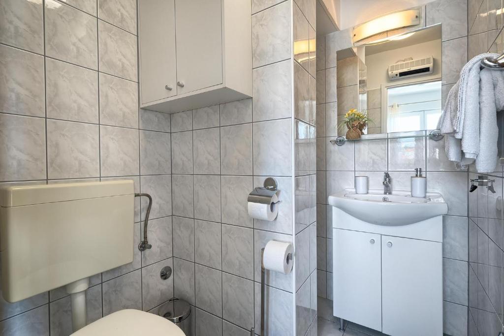Koupelna v ubytování Apartments Irena