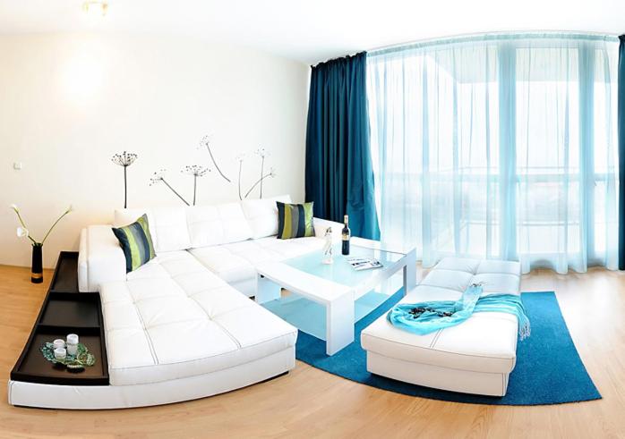 A bed or beds in a room at Sea Dream Rental Apartments