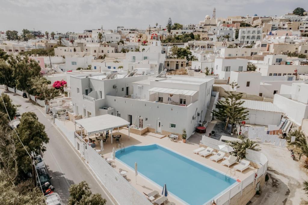 an aerial view of a villa with a swimming pool at Hotel Thirasia in Fira