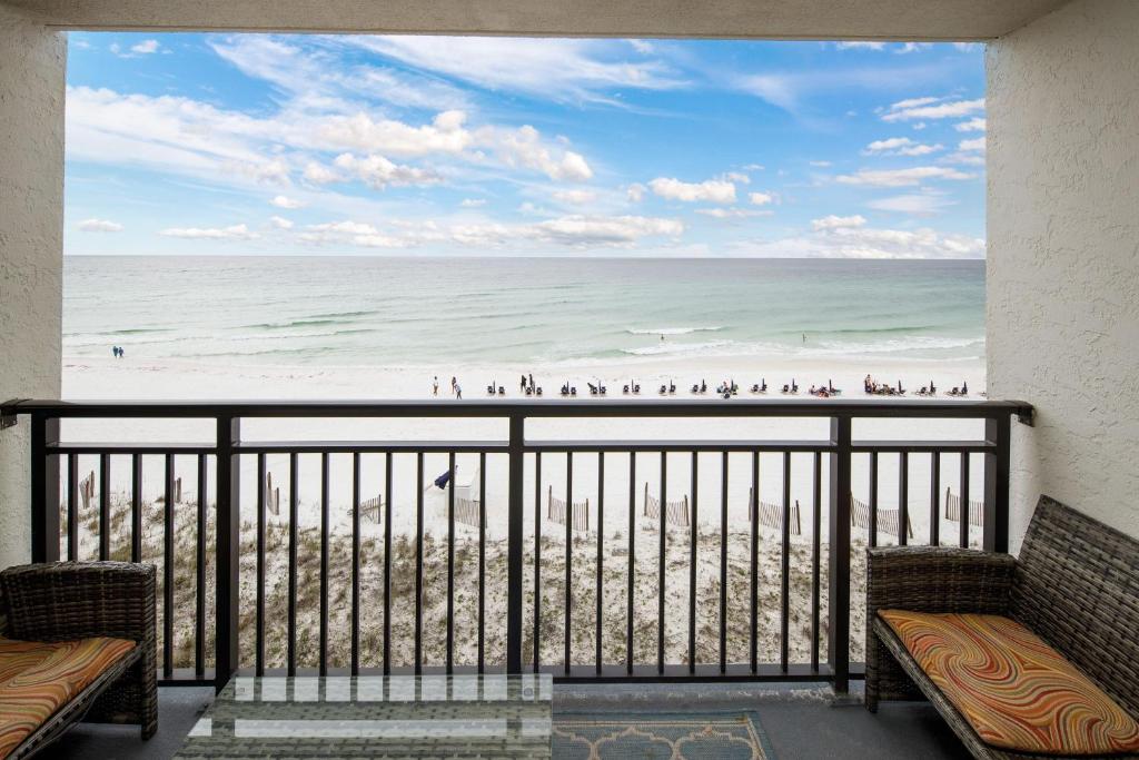 a balcony with a view of the beach at Nautilus 1505 - Gulf Front 1 Bedroom - 5th Floor in Fort Walton Beach
