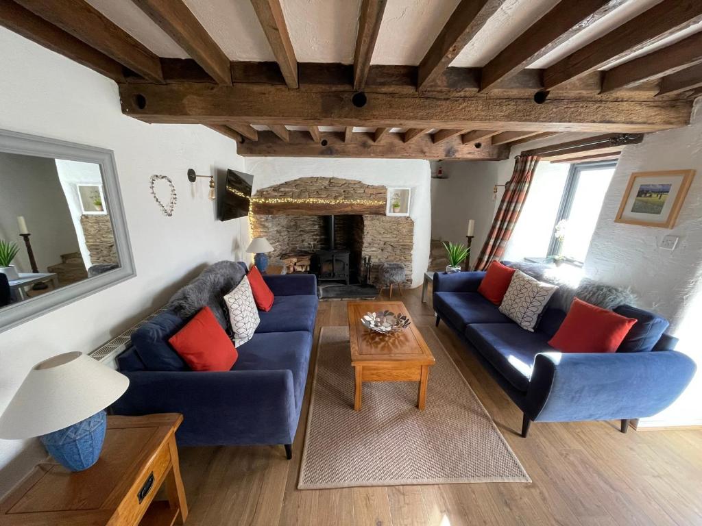 Posezení v ubytování Court Cottage - cosy traditional cottage near lovely beaches