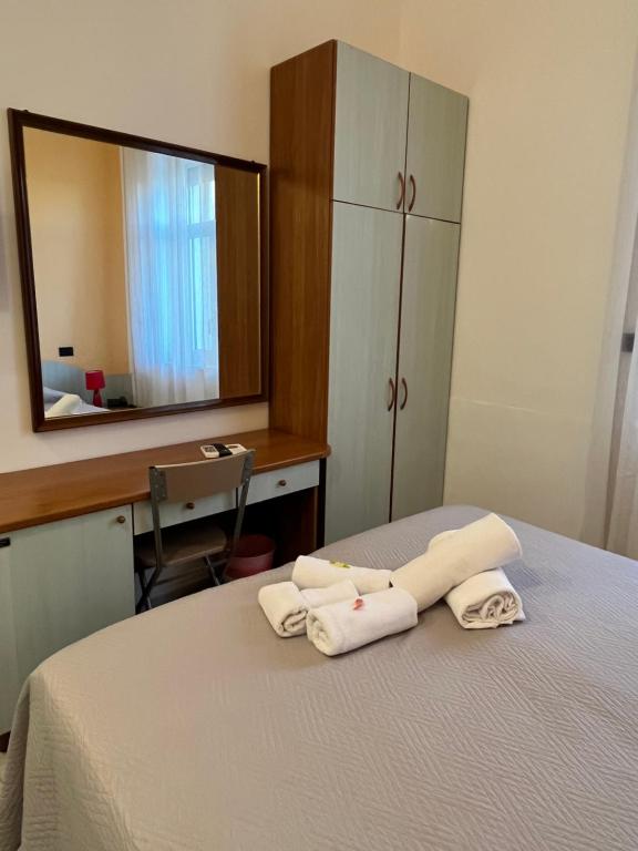 Postel nebo postele na pokoji v ubytování Hotel La Plancia