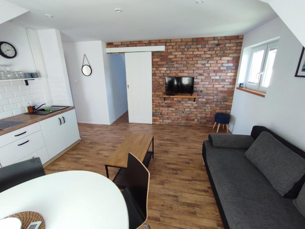 Kuchyň nebo kuchyňský kout v ubytování SOWI KĄT domki i apartamenty