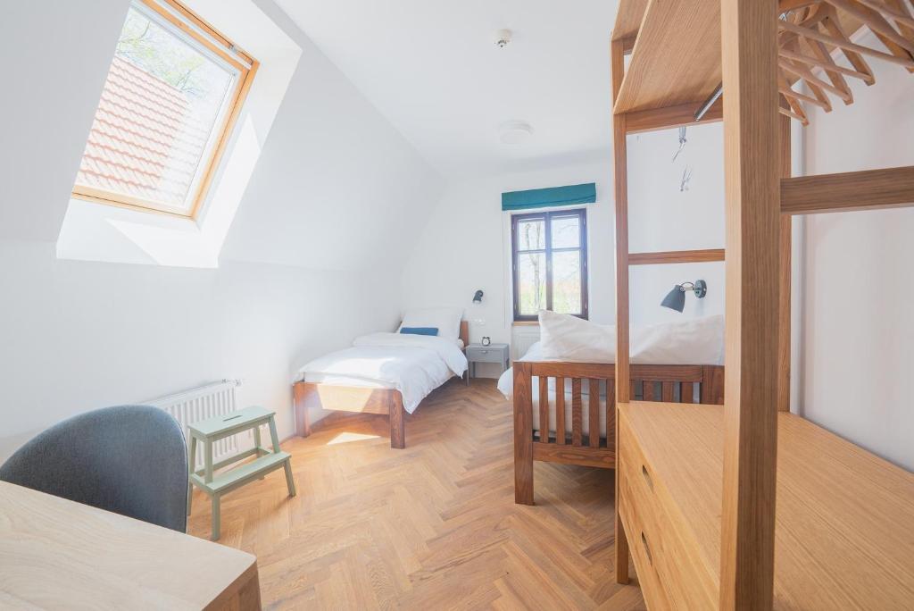 Postel nebo postele na pokoji v ubytování Vlaštovčí dům