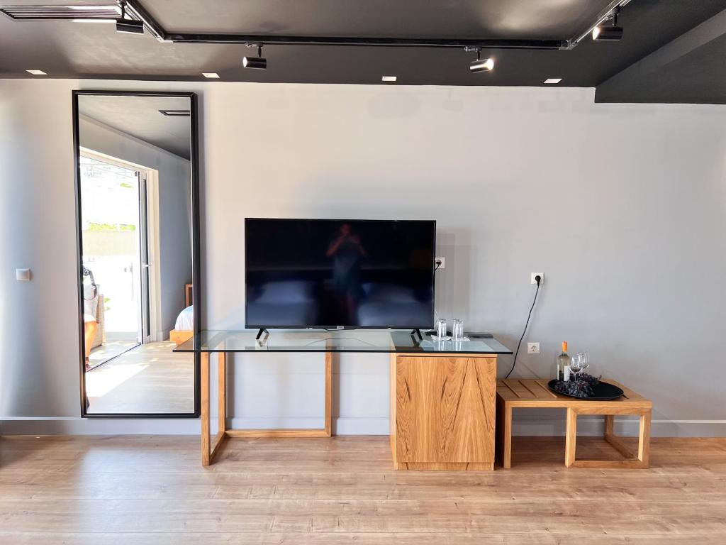 TV a/nebo společenská místnost v ubytování Porto Eda Hotel