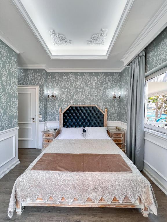 Postel nebo postele na pokoji v ubytování Porto Eda Hotel