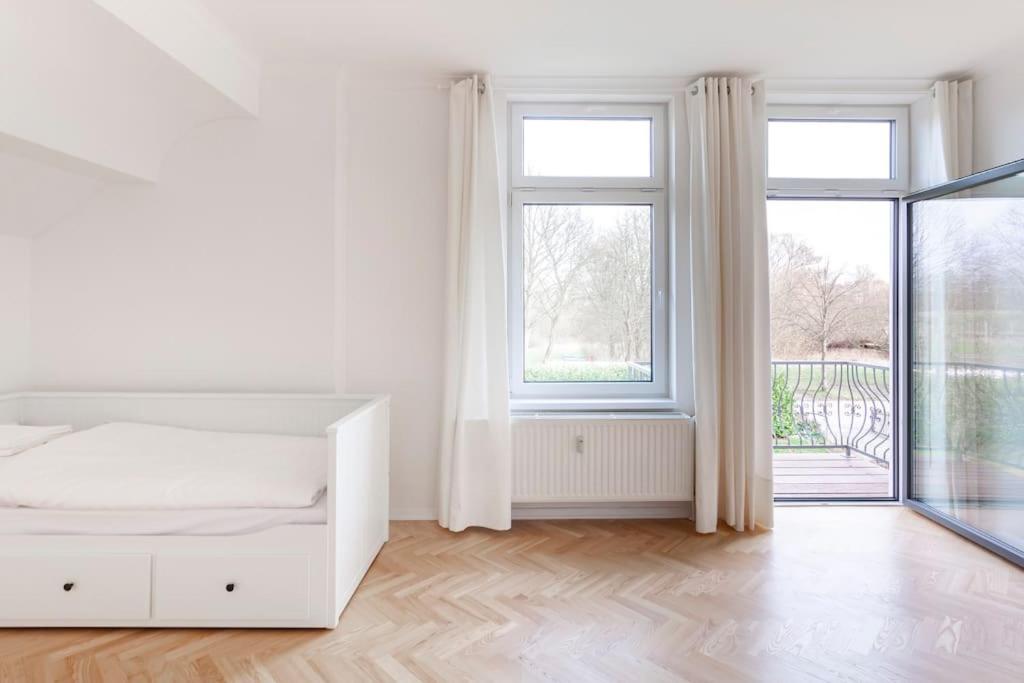 Postel nebo postele na pokoji v ubytování Villa im Alten Land Hamburg - für große Gruppen