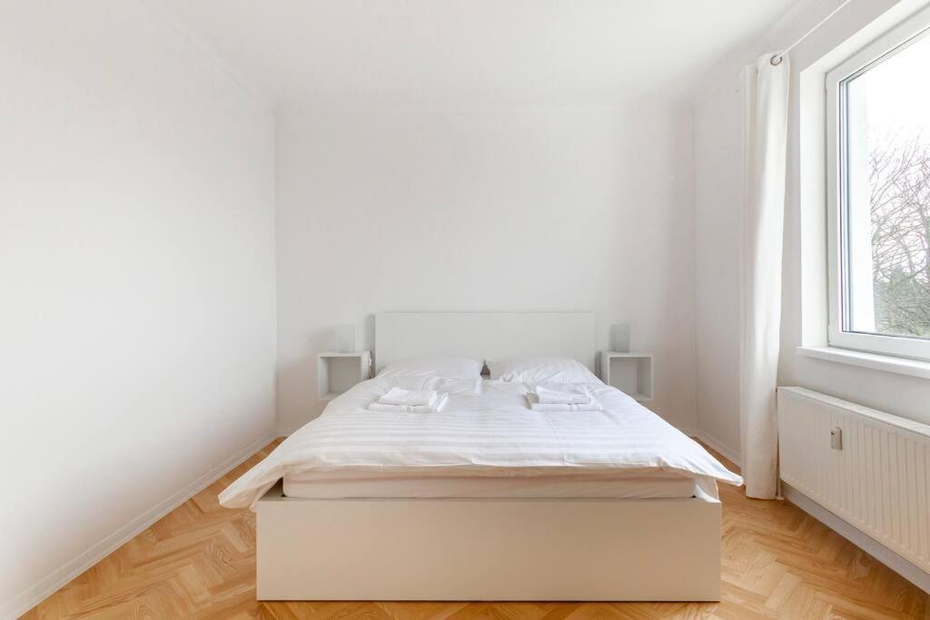Postel nebo postele na pokoji v ubytování Villa im Alten Land Hamburg - für große Gruppen
