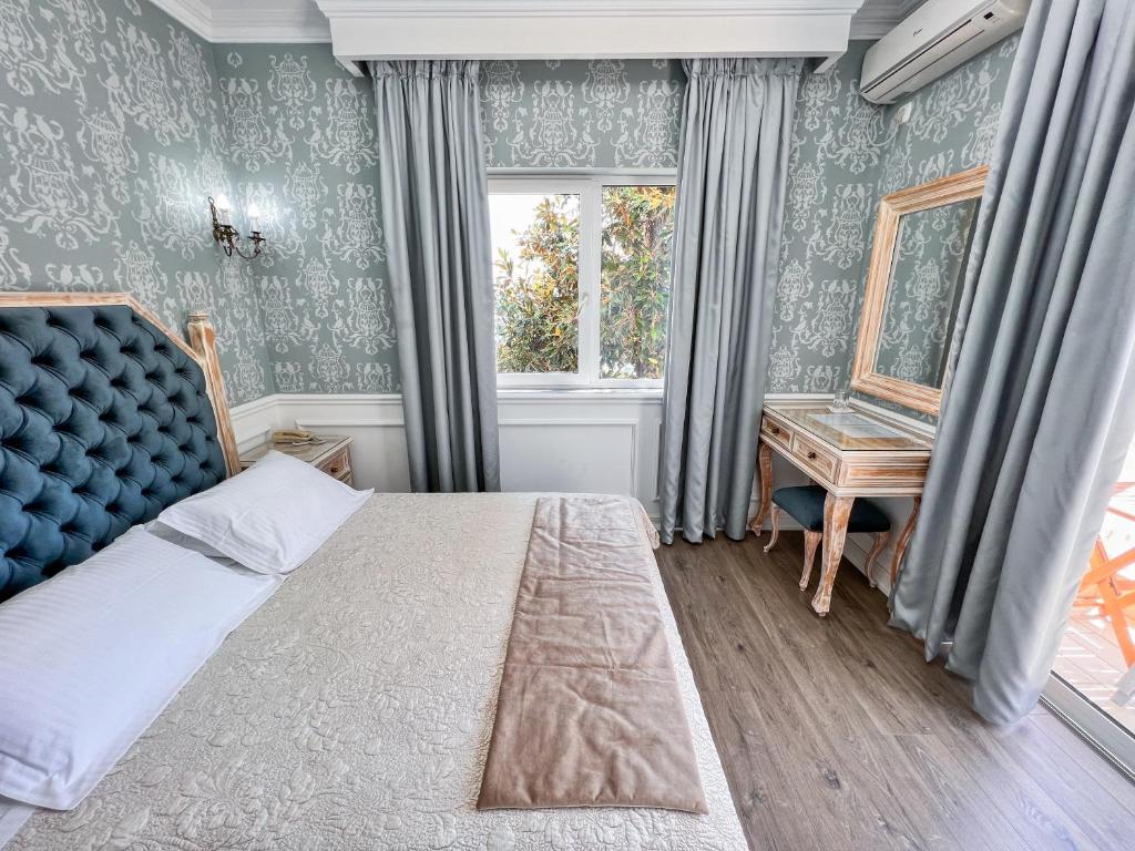 Postel nebo postele na pokoji v ubytování Porto Eda Hotel