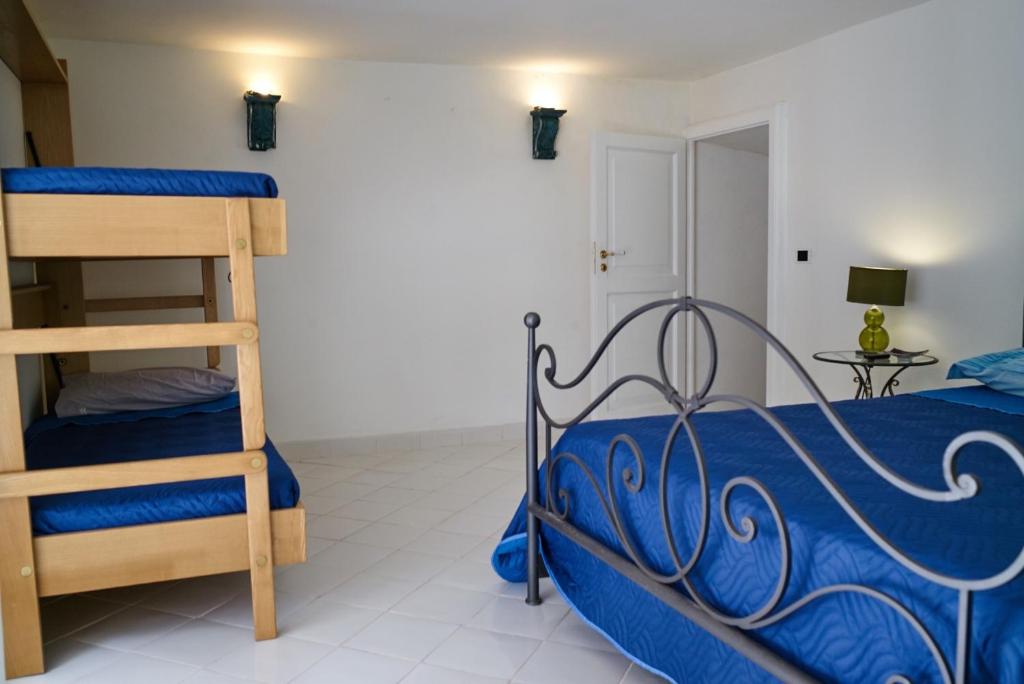 Postel nebo postele na pokoji v ubytování Villacore Capri