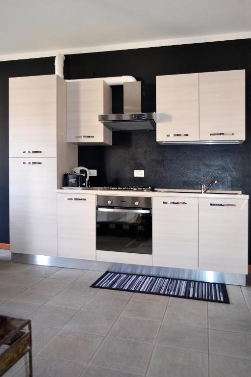 Kuchyň nebo kuchyňský kout v ubytování Apartment Il Fiore