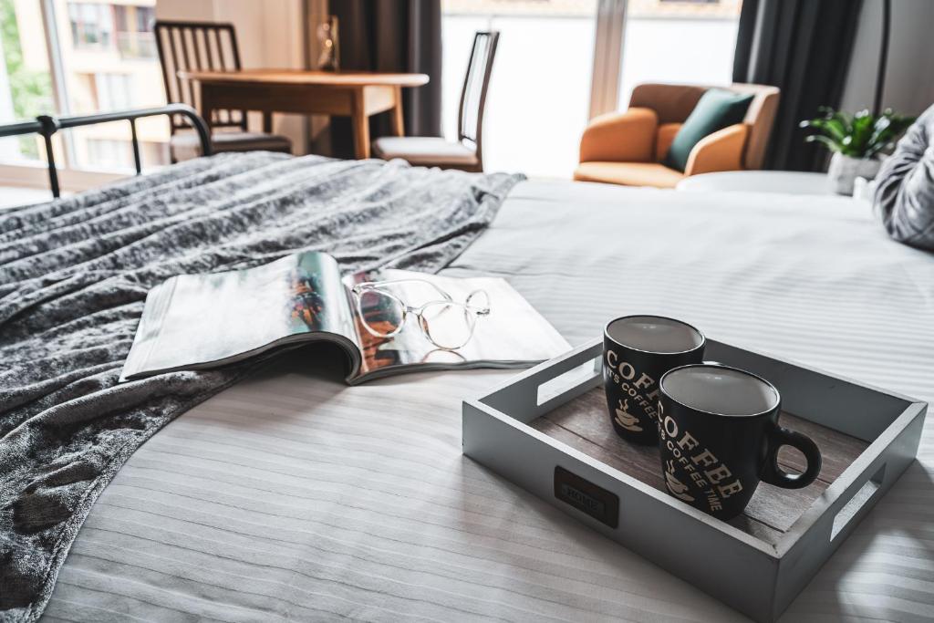Postel nebo postele na pokoji v ubytování Pure Rental Apartments Inżynierska