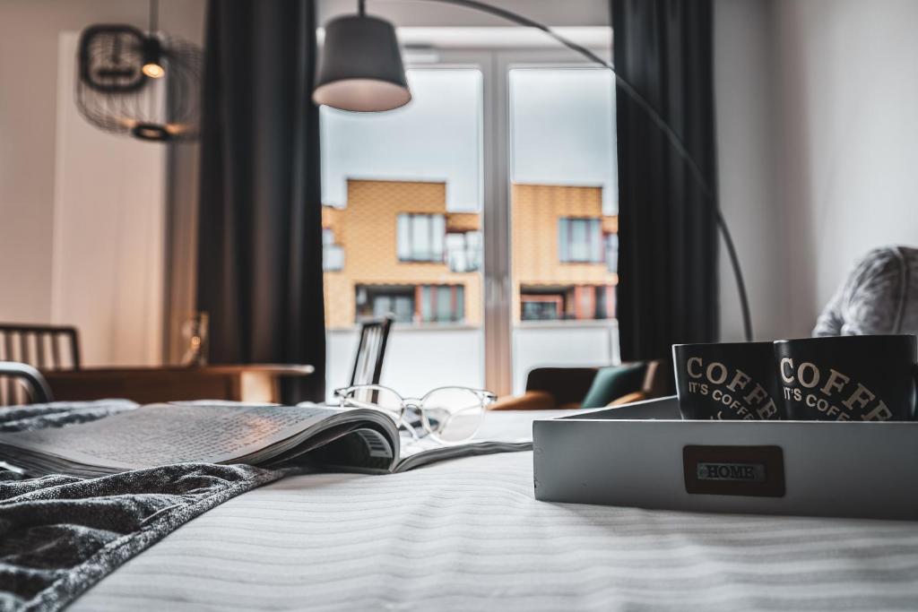 Postel nebo postele na pokoji v ubytování Pure Rental Apartments Inżynierska