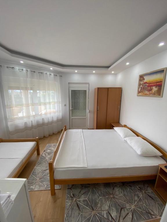 Postel nebo postele na pokoji v ubytování Ceka Apartments
