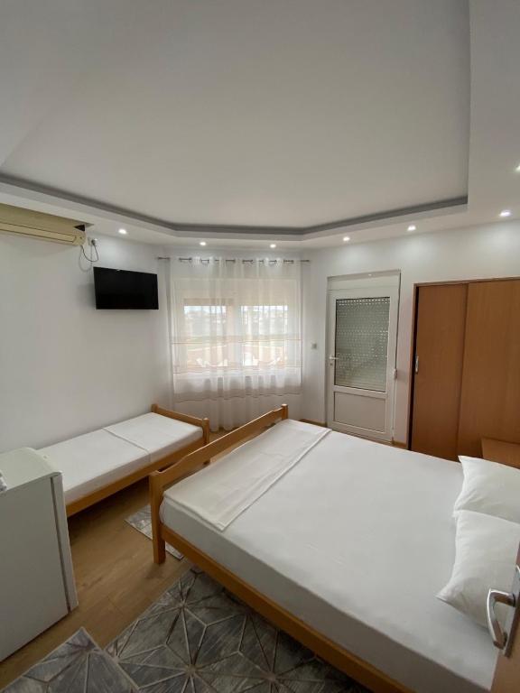Postel nebo postele na pokoji v ubytování Ceka Apartments