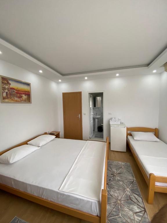 Postel nebo postele na pokoji v ubytování Ceka Apartments