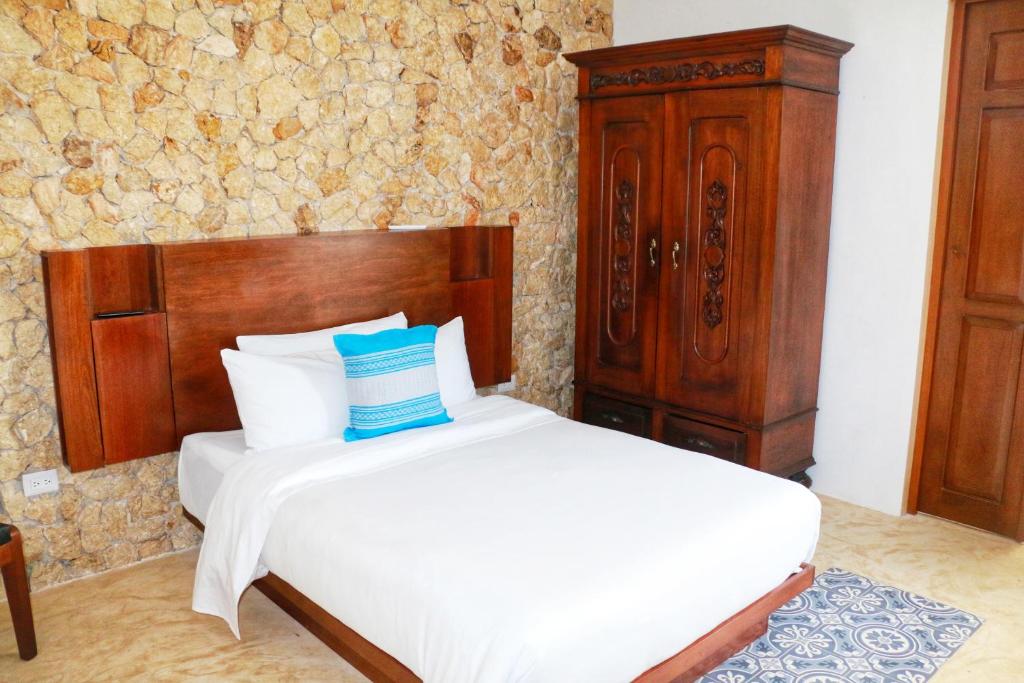 Postel nebo postele na pokoji v ubytování Boutique Casa Azuli Santiago