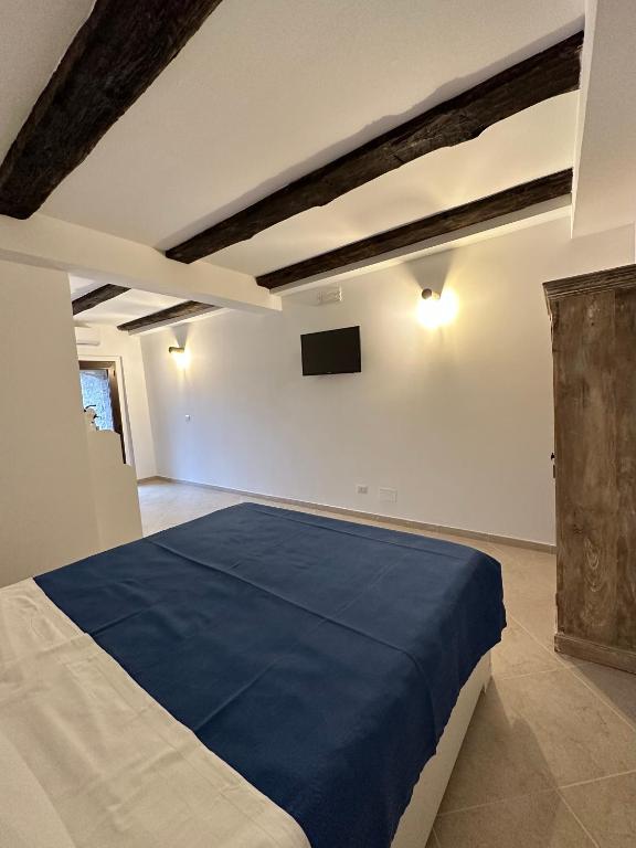 Postel nebo postele na pokoji v ubytování Terrazzo sullo Ionio