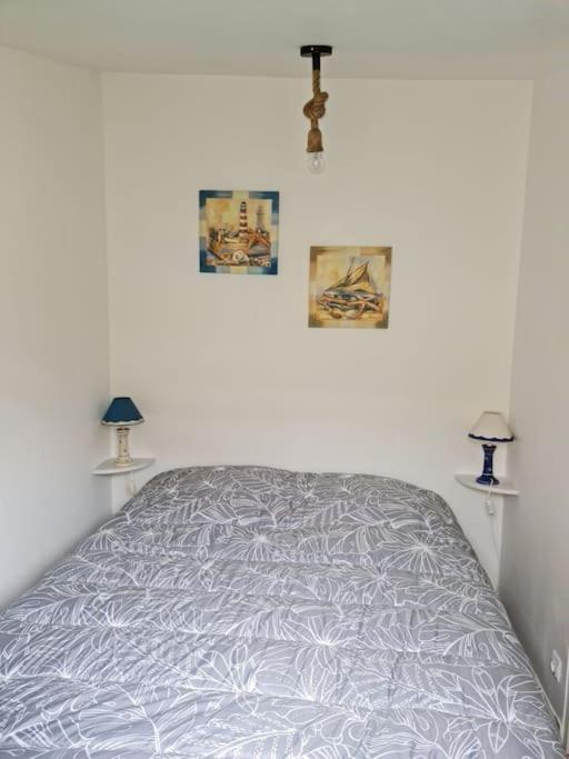 Postel nebo postele na pokoji v ubytování Chalet 25 m de la mer
