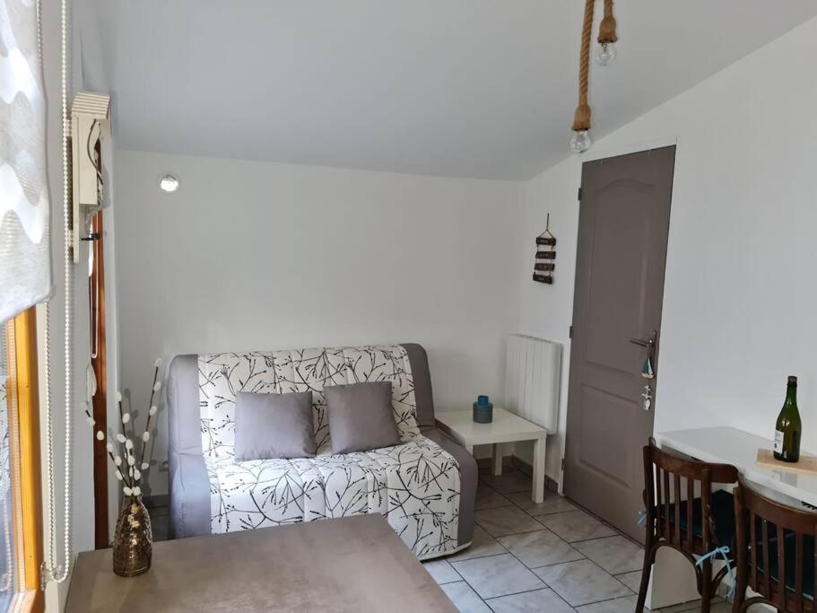 Postel nebo postele na pokoji v ubytování Chalet 25 m de la mer