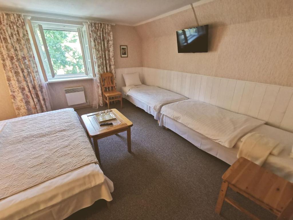 Postel nebo postele na pokoji v ubytování Viesu māja Sprīdīši