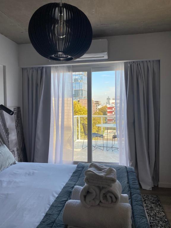 Cama ou camas em um quarto em Palermo Jai