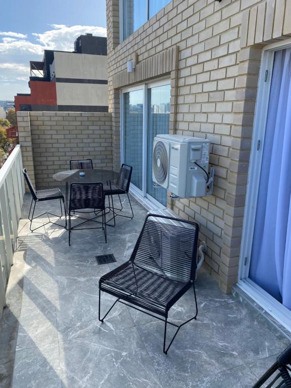 Uma varanda ou terraço em Palermo Jai