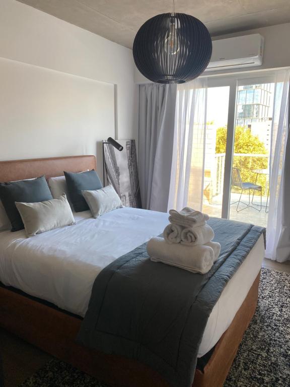 Cama ou camas em um quarto em Palermo Jai