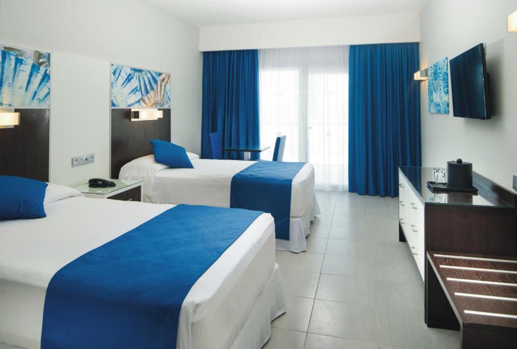 Voodi või voodid majutusasutuse Riu Reggae - Adults Only - All Inclusive toas