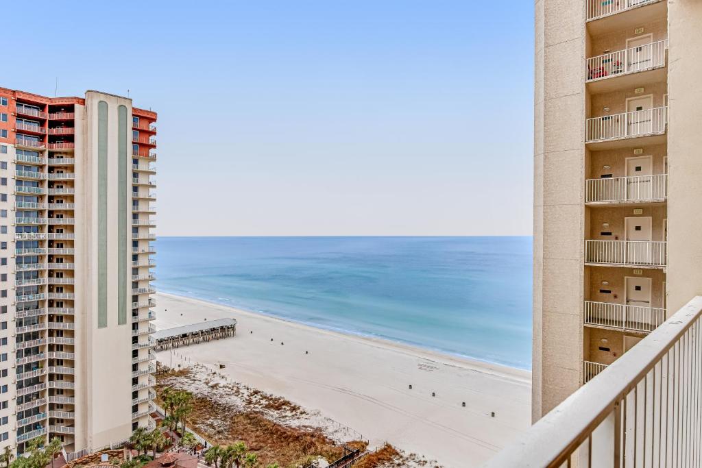 a view of the beach from the balcony of a building at Shores of Panama 1507 in Panama City Beach