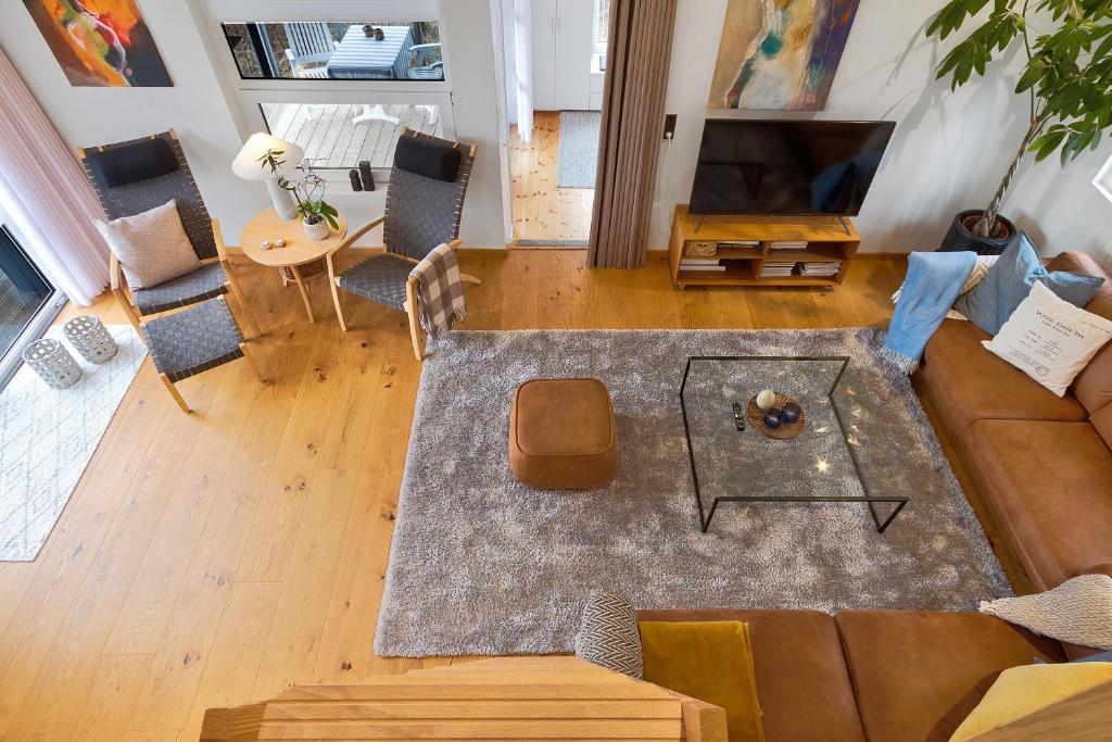 TV a/nebo společenská místnost v ubytování Beautiful Home In Blokhus With 1 Bedrooms