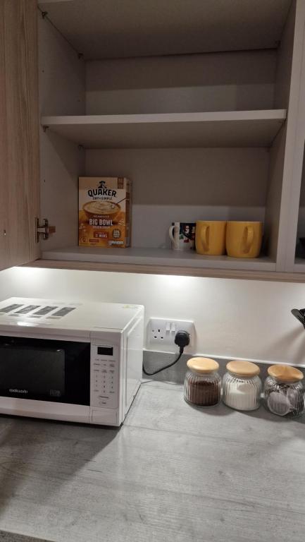 Kuchyň nebo kuchyňský kout v ubytování Luxury Apartment Birmingham