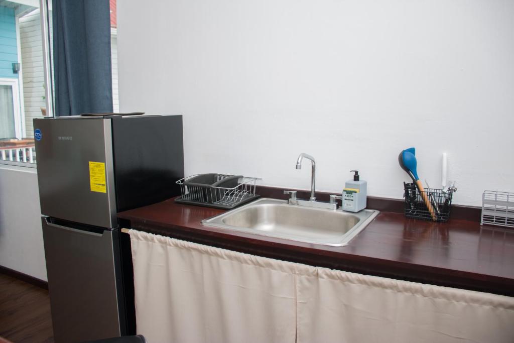 Kuchyň nebo kuchyňský kout v ubytování Chango's Apartments