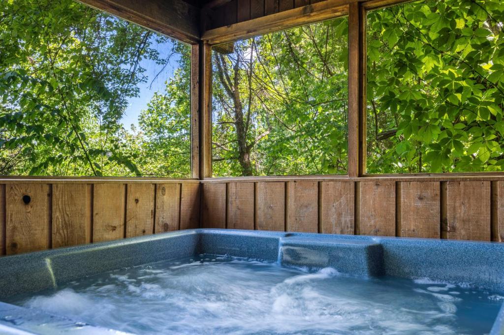 Romantic log cabin with hot tub photo