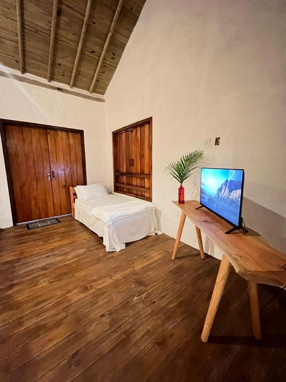 TV a/nebo společenská místnost v ubytování Villa Sagui Trancoso