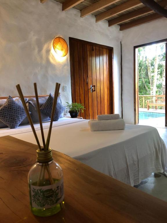 Postel nebo postele na pokoji v ubytování Villa Sagui Trancoso